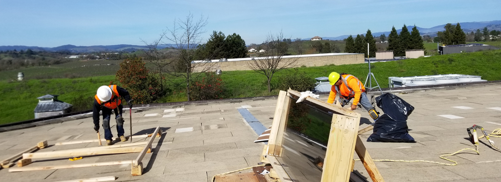 Construction workers on a rooftop
